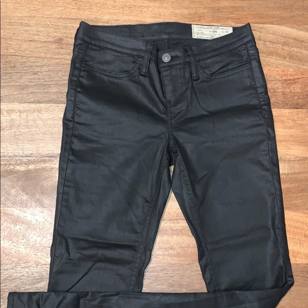 Leather-like coated All Saints jeans